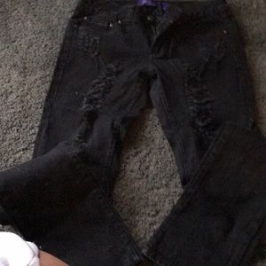 Miley Cyrus black jeans